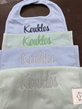 Load image into Gallery viewer, Embroidered Baby Bib “Kouklos” or “Koukla” Design—Multiple color choices (free USA shipping included)
